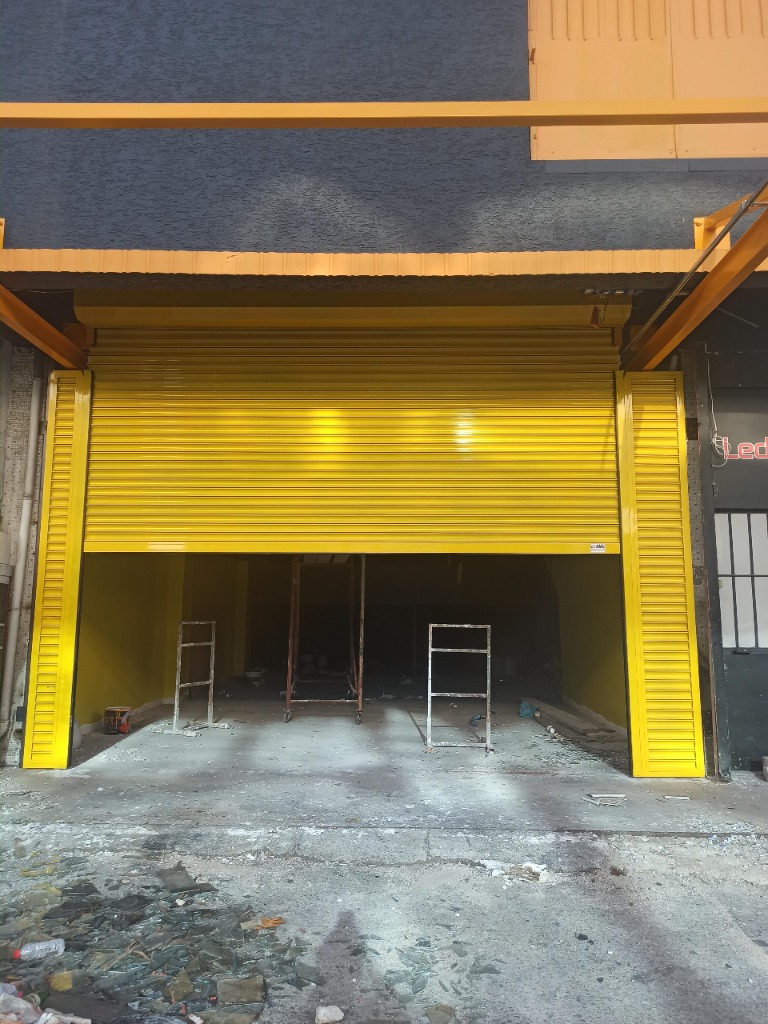 Özel sarı fırın boyalı dükkan ve showroom kepengi